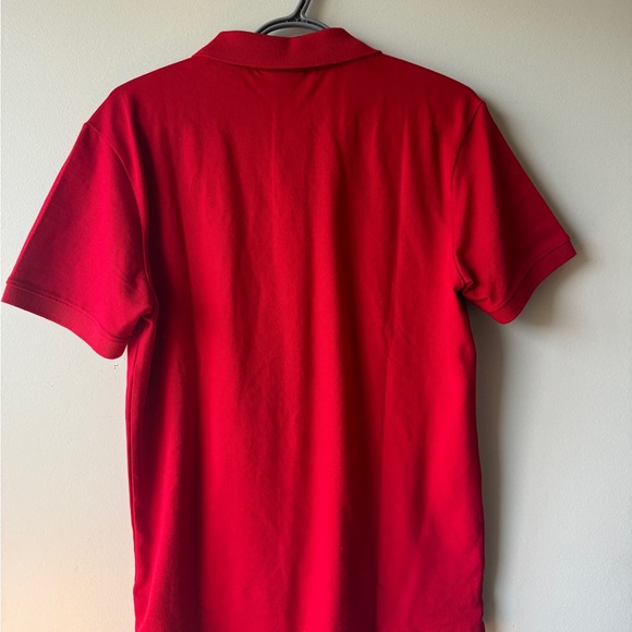 Never worn original Red Lacoste Medium size polo. - Picture 3 of 3